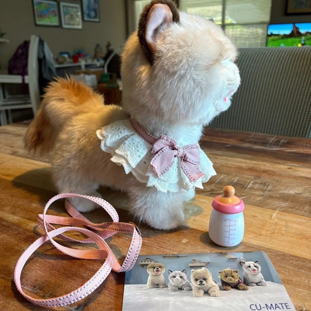 Battery powered Cat Toy that walks, miaus/talks, drinks milk and shakes tail.